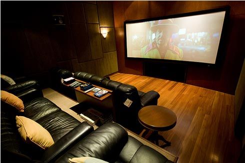 luxury-theatre-room-ideas-with-black-leather-on-sofa-and-wooden-floor-decorations.jpg