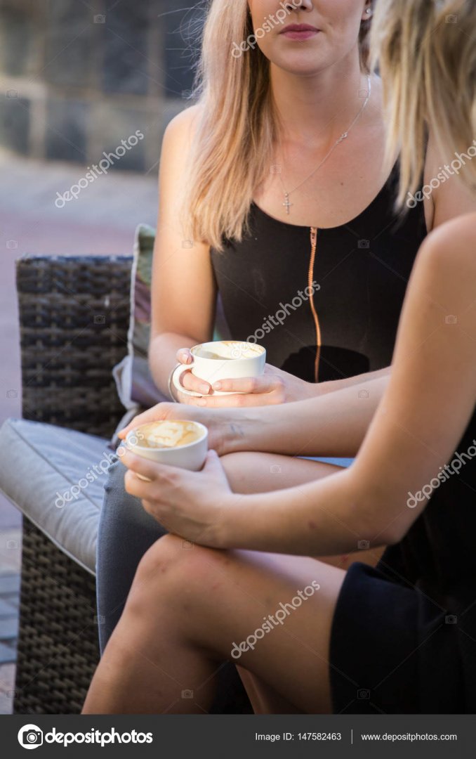 depositphotos_147582463-stock-photo-female-models-drinking-coffee.jpg