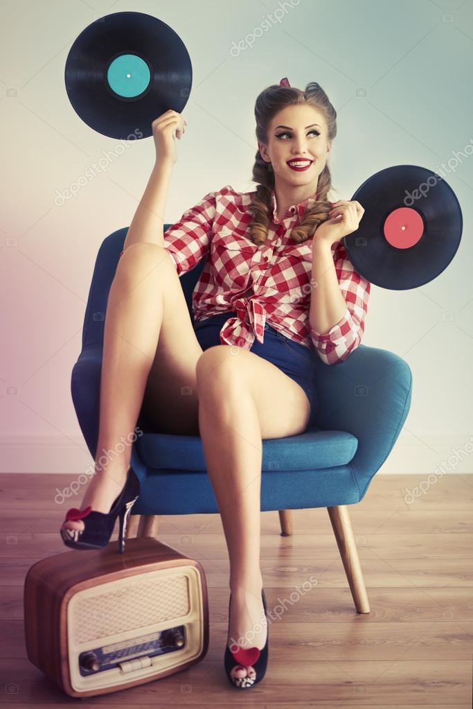 depositphotos_110299112-stock-photo-pin-up-girl-with-vinyl.jpg