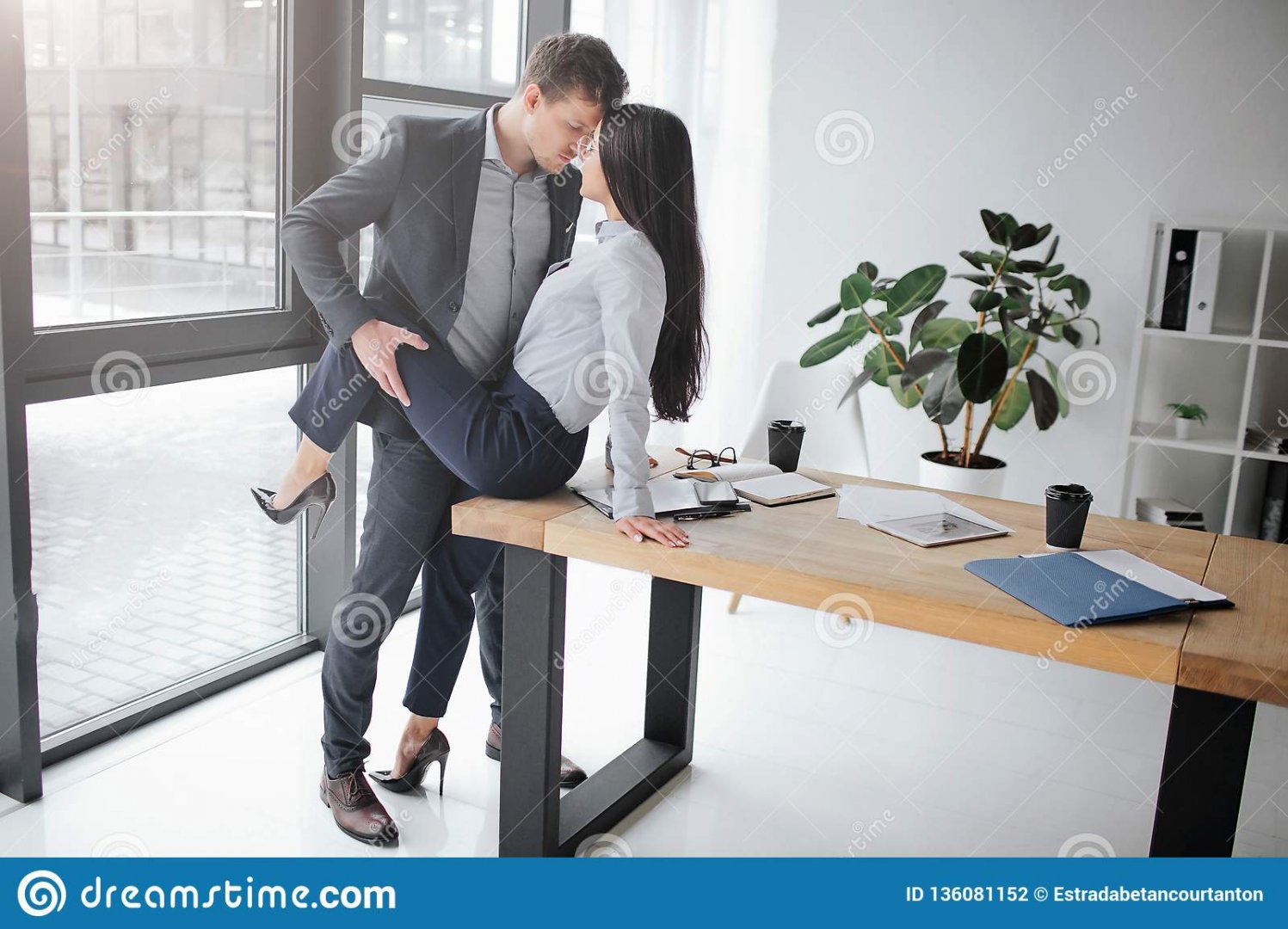 sexual-intimate-picture-couple-work-sit-table-hold-her-leg-sexual-pose-keep-faces-close-sexual...jpg