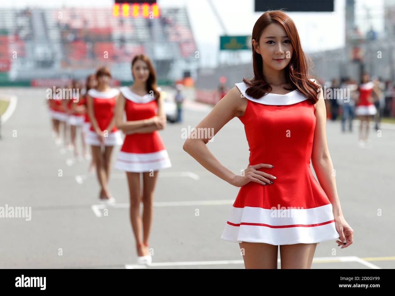 formula-one-grid-girls-stand-before-the-third-practice-session-of-the-korean-f1-grand-prix-at-...jpg