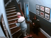 drunk-couple-stairs-falling.gif