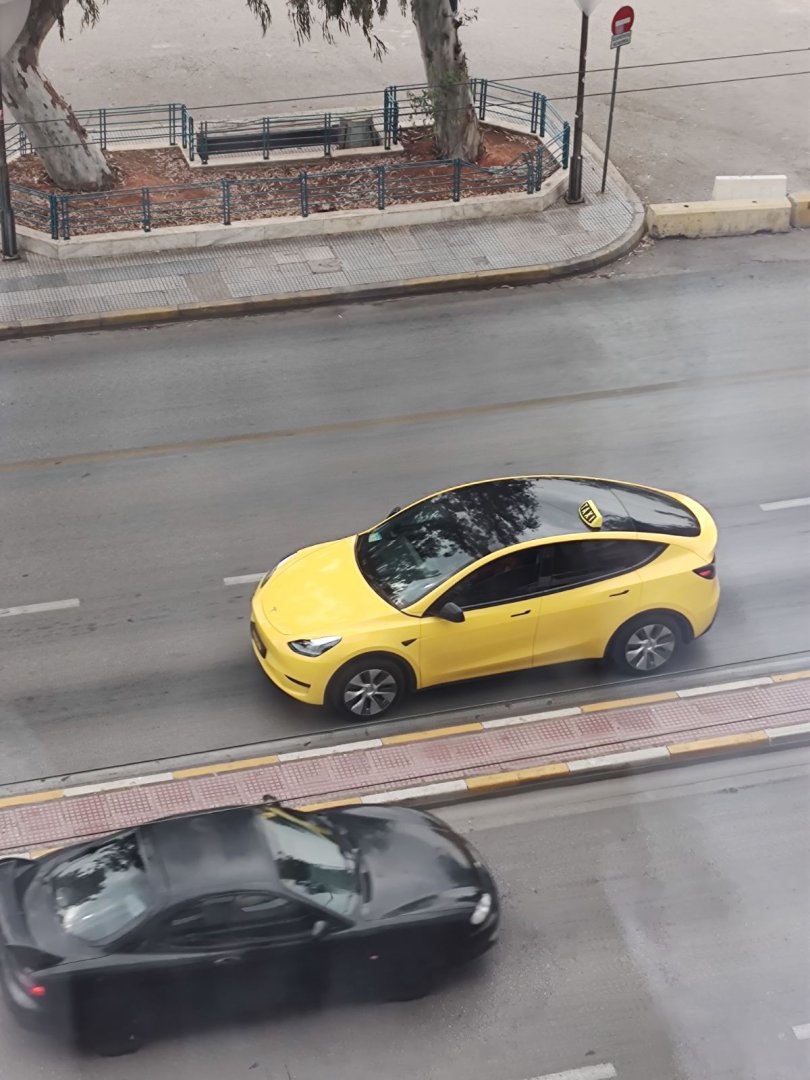 tesla taxi.jpg